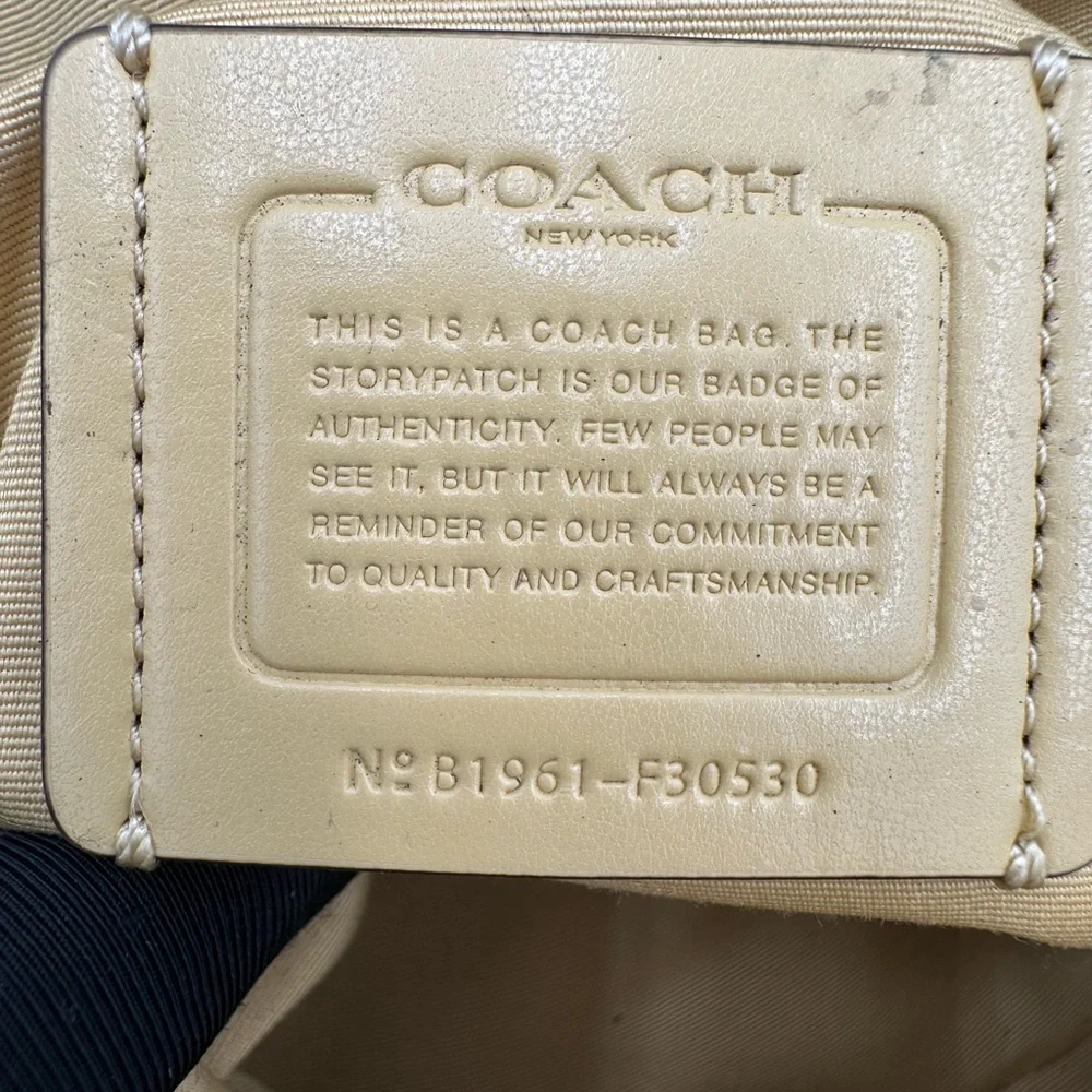 EUC Coach Andi Convertible Backpack with Structured Design. Metallic Hardware.